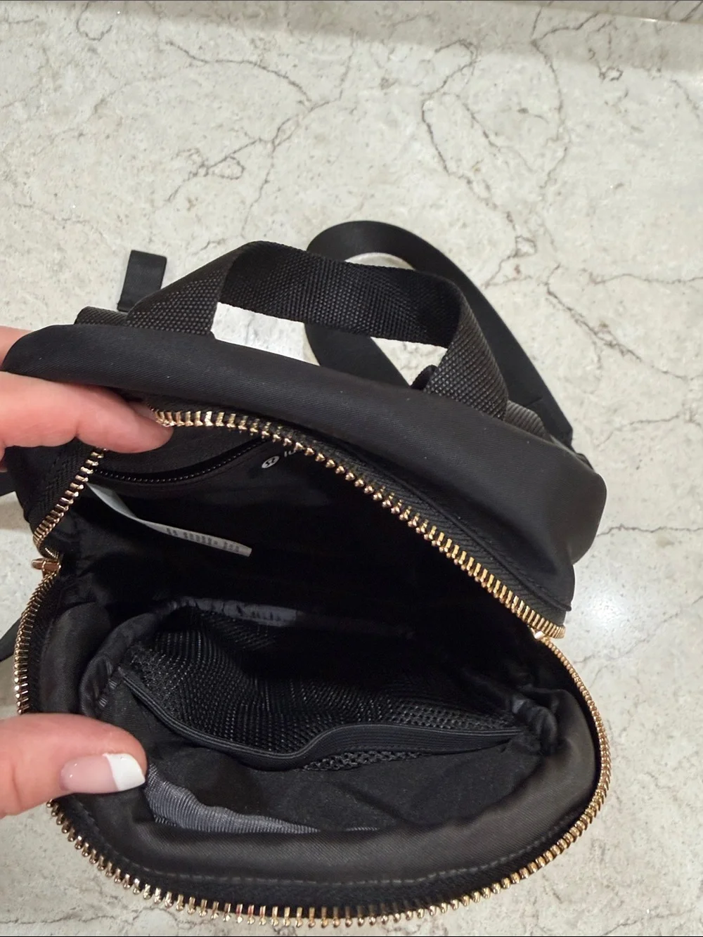 lululemon athletica Black Mini Backpack with Gold Accents. new without tags